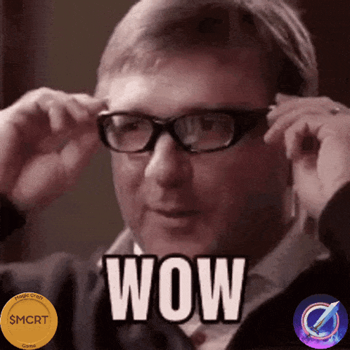 a man wearing glasses says wow in a gif
