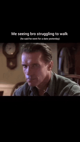 a close up of arnold schwarzenegger 's face with the caption me seeing bro struggling to walk .