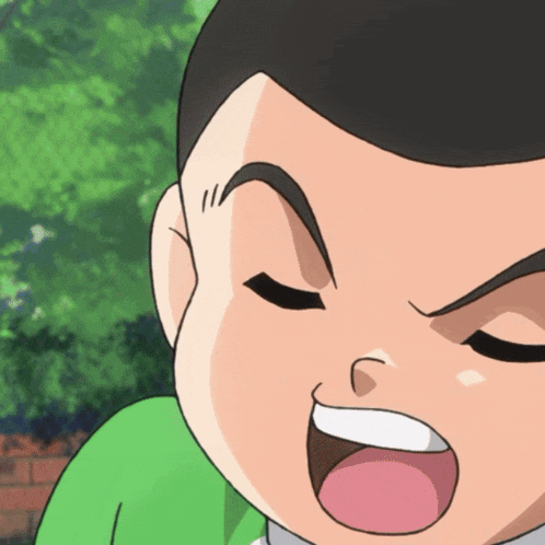a close up of a boy 's face with his eyes closed