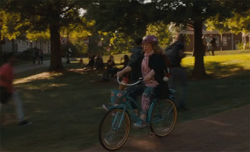 Riding A Bike Bike Ride GIF - Riding A Bike Bike Ride Delighted GIFs