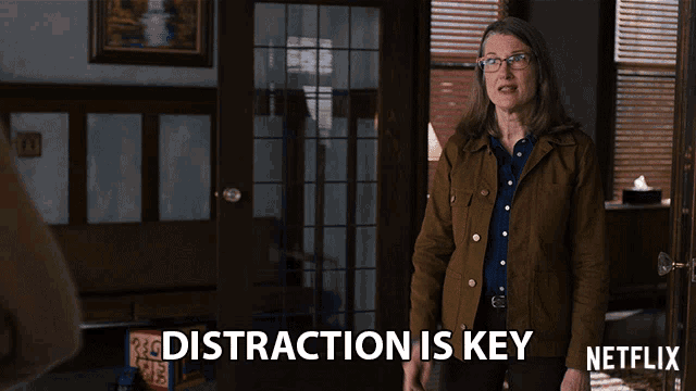 a woman in a brown jacket says distraction is key in a netflix advertisement