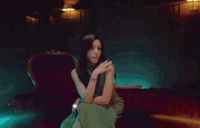 a woman in a green dress is surrounded by hearts and the words every day