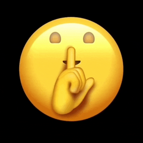 a yellow smiley face with a finger to its mouth