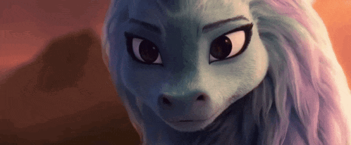 a close up of a cartoon dragon 's face with a serious look on its face .
