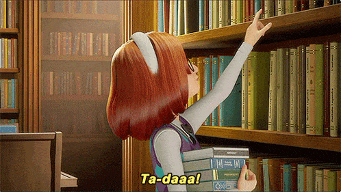 a girl in a library with ta-daaa written on the bottom right