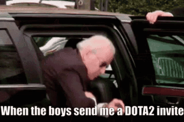 a man in a suit is getting out of a car with the words when the boys send me a dota2 invite
