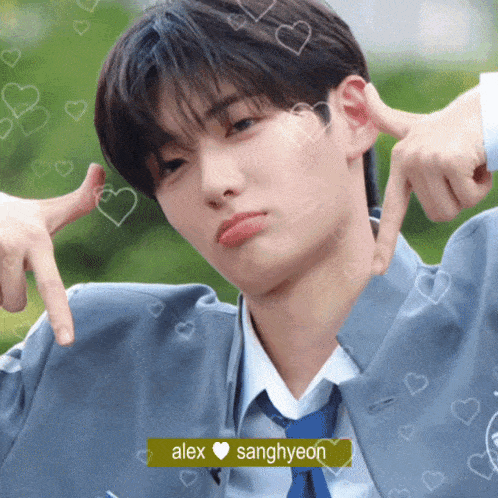 a close up of a person 's face with the name alex sanghyeon on the bottom