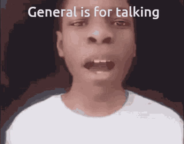 a young boy is making a funny face with the words general is for talking behind him