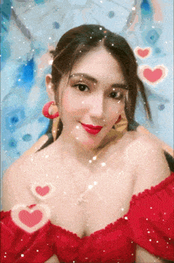 a woman in a red top with hearts around her