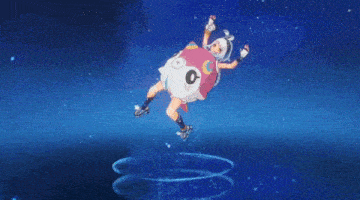 a colorful globe is floating in the middle of the ocean