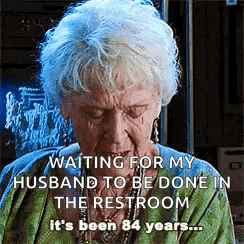 an elderly woman is crying while waiting for her husband to be done in the restroom it 's been 84 years .