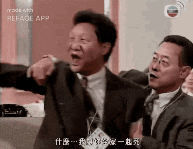 two men in suits and ties are standing next to each other with their arms outstretched