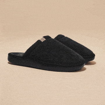 a pair of brunch essential beige slippers are shown