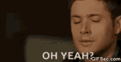 a close up of a man 's face with his eyes closed and the words `` oh yeah '' .