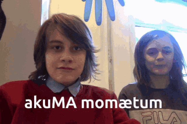 a boy and a girl standing next to each other with akuma momaetum written on the bottom