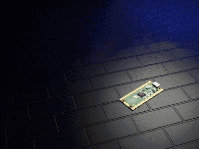 a motherboard is laying on a black tiled floor