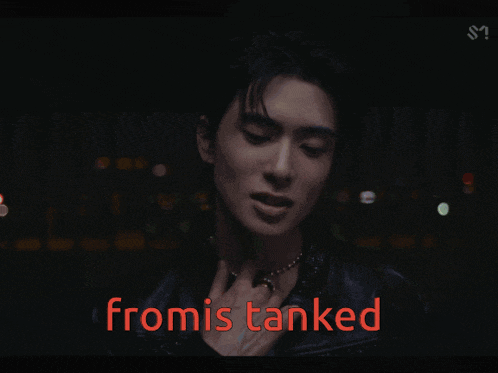 a man in a black leather jacket with the words fromis tanked behind him