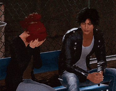 a man in a leather jacket sits next to a woman who is covering her face