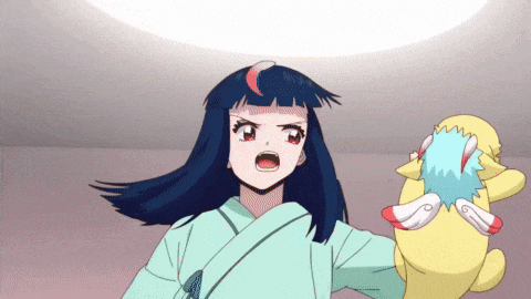 a girl in a kimono is holding a stuffed animal with wings