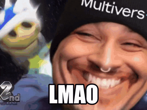 a man wearing a hat that says multivers is smiling