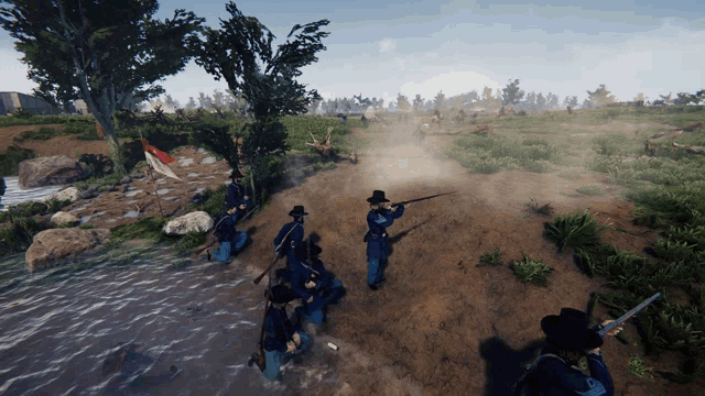 a group of soldiers are kneeling in the dirt holding their guns