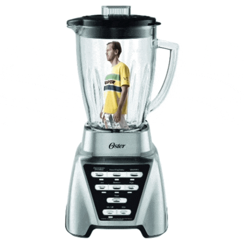 an oster blender with a man in a yellow shirt inside of it