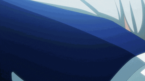 a close up of a blue object with a white background