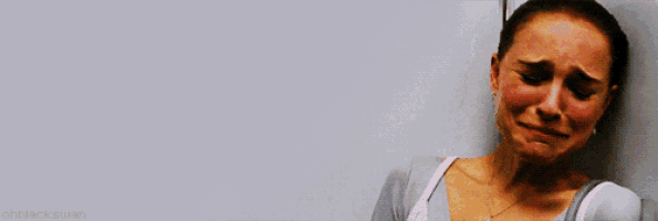 a woman is crying while leaning against a wall and the words ohblackswan are on the bottom