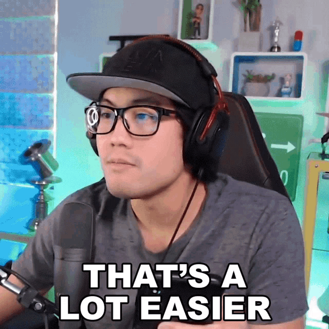 a man wearing headphones and glasses says " that 's a lot easier "