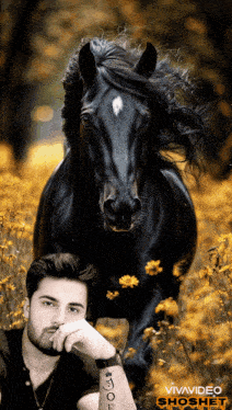 a man with a tattoo on his arm stands next to a horse