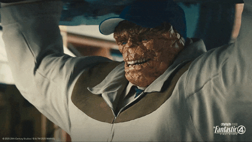 a poster for fantastic four shows a man in a suit and hat