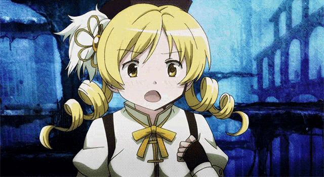 a girl with blonde hair is wearing a black hat and a white shirt