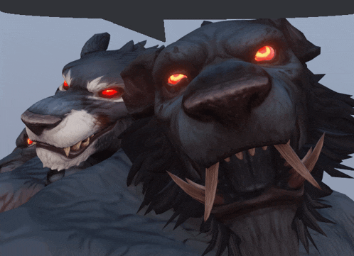 two monsters with red eyes and sharp teeth