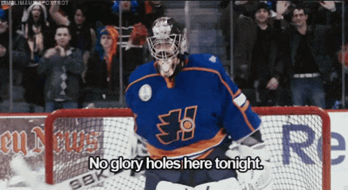 a hockey goalie says no glory holes here tonight in front of a crowd