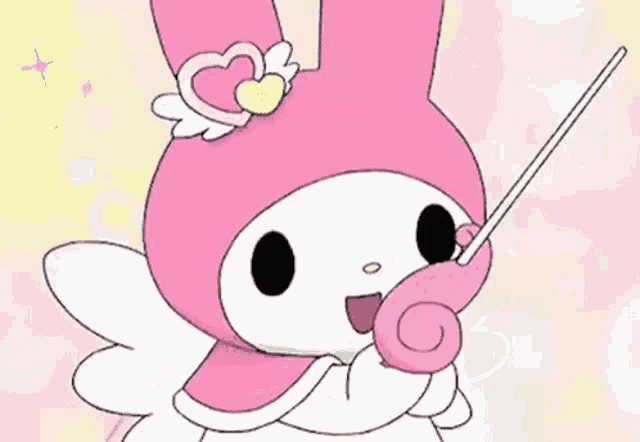 a cartoon of a pink bunny with wings and a heart on its head .