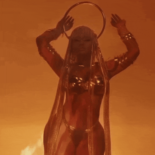 a woman in a costume with a ring around her head