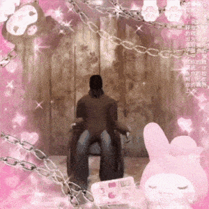 a man in a wheelchair is surrounded by chains and a pink bunny
