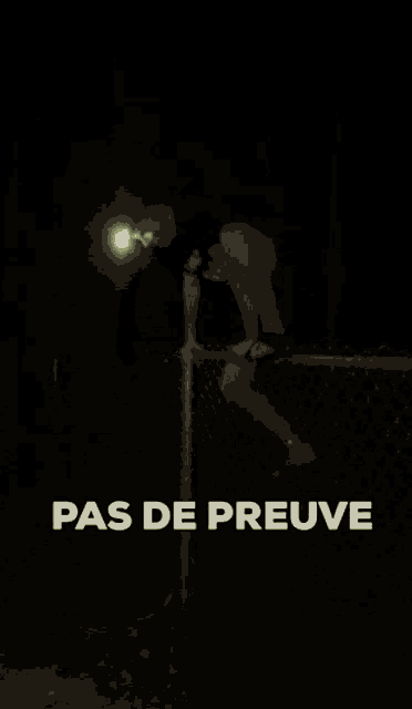 a person is crawling in the dark with a flashlight and the words pas de preuve are above them