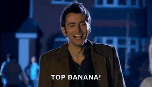 a man in a suit says top banana