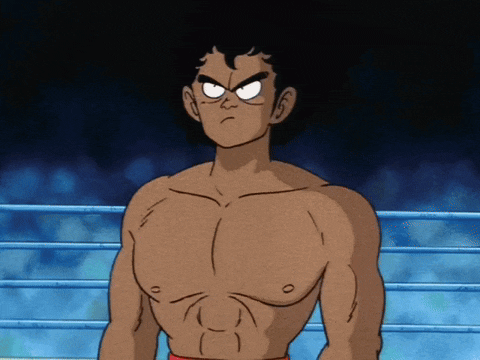 a cartoon of a man without a shirt standing in a ring