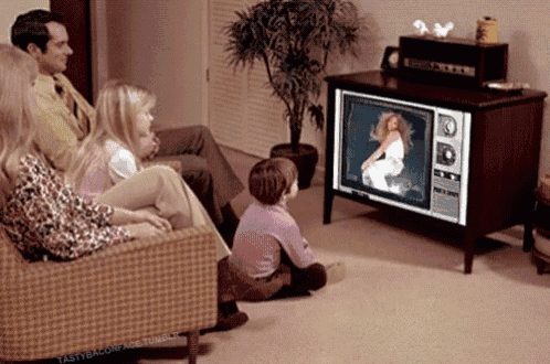 a family is sitting in front of a television with the words tasty baconade tumblr written on the bottom