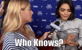 a woman is being interviewed by another woman with the words who knows behind them