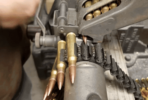 Belt Loader Chain Gun GIF - Belt Loader Chain Gun Machine Gun Link GIFs