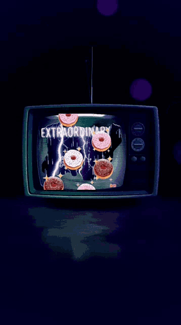 a television screen with donuts on it and the words extraordinary