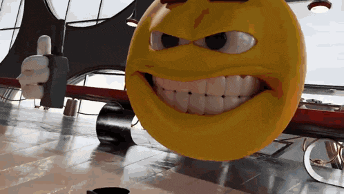 a yellow smiley face with big teeth is sitting on a tiled floor