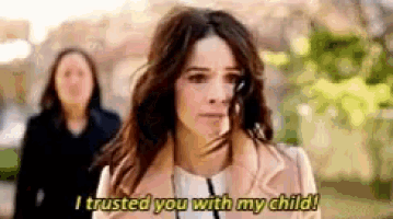 a woman is talking to another woman and says `` i trusted you with my child ! ''