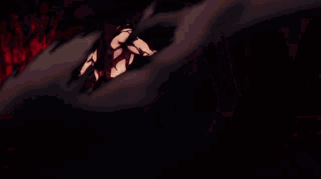 a man with blood on his face is smiling and looking at the camera