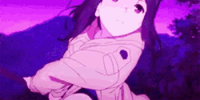 a girl in a pink jacket is standing in front of a purple sky .