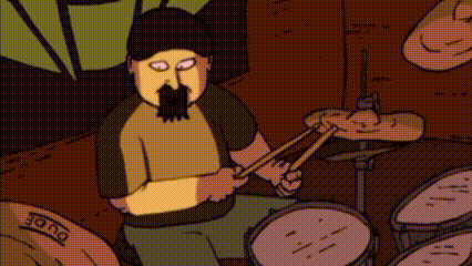 a man with a beard is playing drums in a band .
