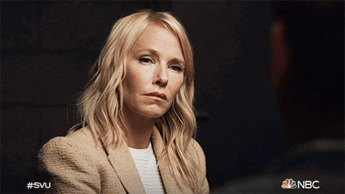 a picture of a woman with #svu on the bottom right